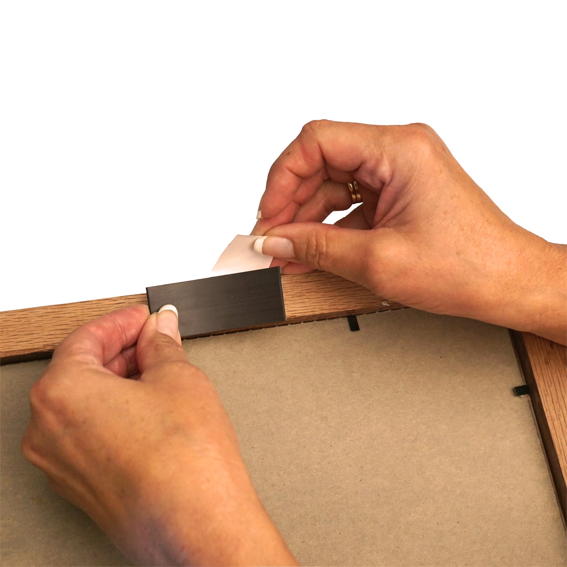 Load image into Gallery viewer, ZGN40HPAA Flexible Magnetic Strip with Adhesive - In Use
