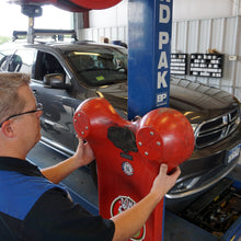 Load image into Gallery viewer, NACK189 Grade 42 Neodymium Magnetic Hook - Demonstration of Magnet Holding Heavy Automobile Shop Equipment