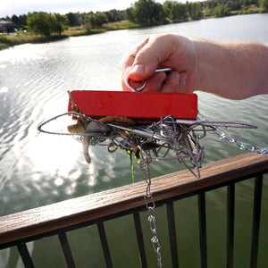 07542 Heavy-Duty Holding and Retrieving Magnet - Hand Holding Magnet with a Tangled Mess of Fishing Hooks