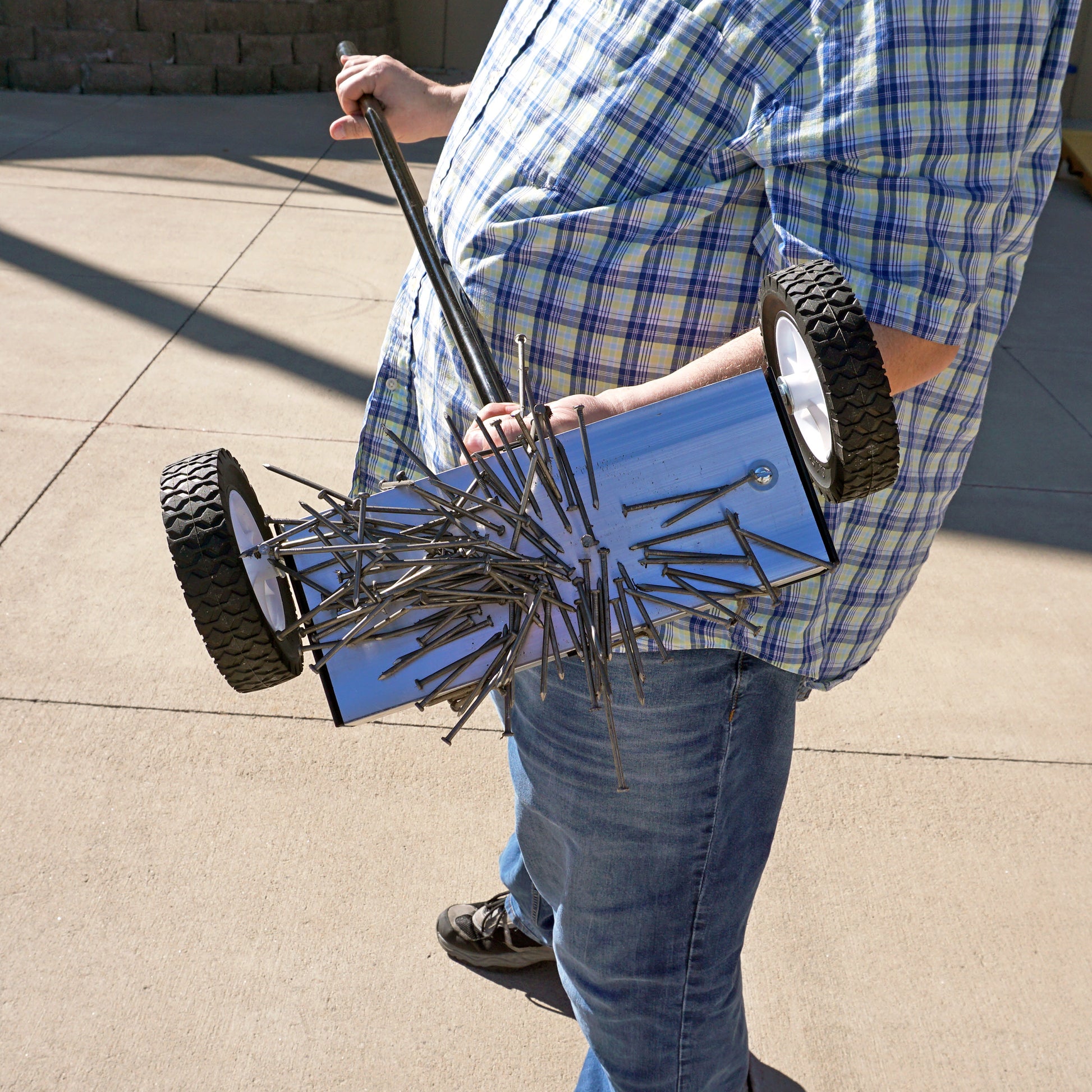 Load image into Gallery viewer, MFSM12 Magnetic Floor Sweeper - Bottom of Sweeper with Metal Debris Attached