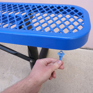 50683 Magnetic Key, SC1-68 Blue - Hand Holding Blue Magnetic Key Next to a Metal Bench