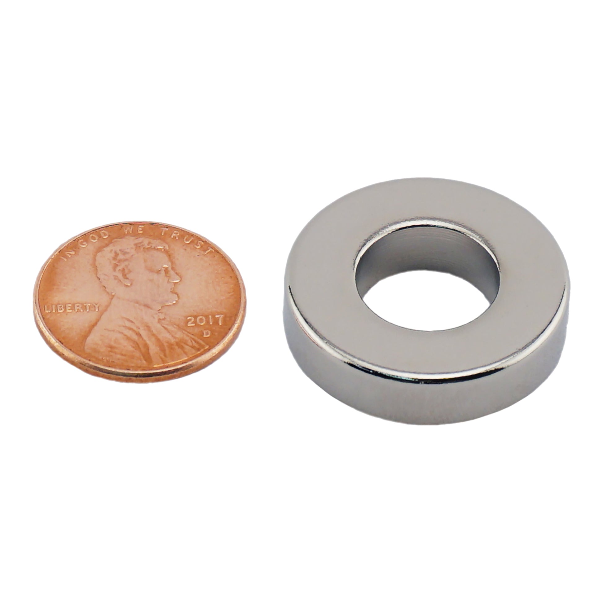 Load image into Gallery viewer, NR010012N Neodymium Ring Magnet - Compared to Penny for Size Reference