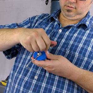 MHHH25HOOK Reversible Magnetic Hook - Man Demonstrating Assembly with Allen Wrench of Magnetic Hook